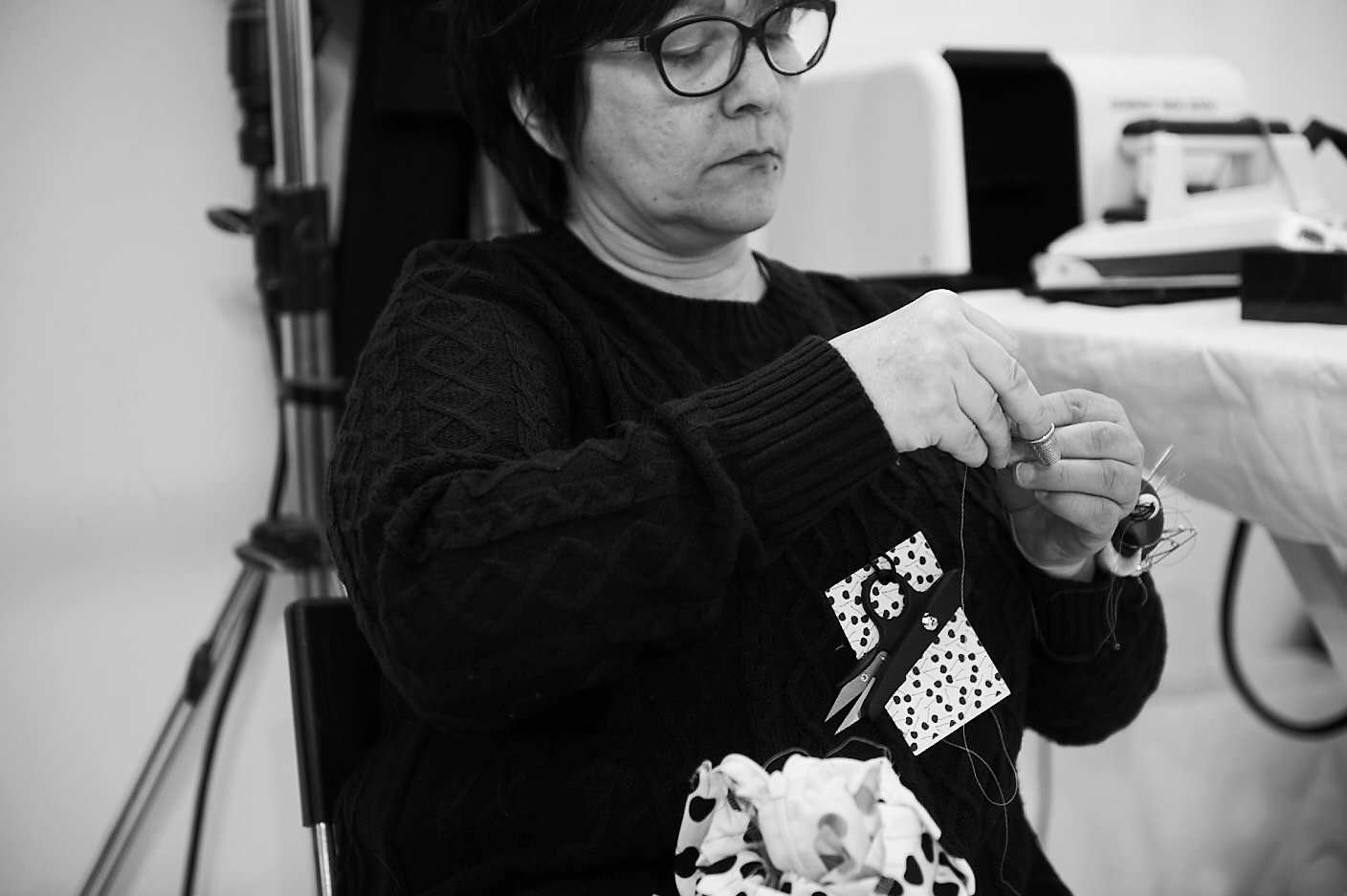 black and white fashion stylist reportage image captured moment backstage sowing the clothing in narrative fashion tell a story 5