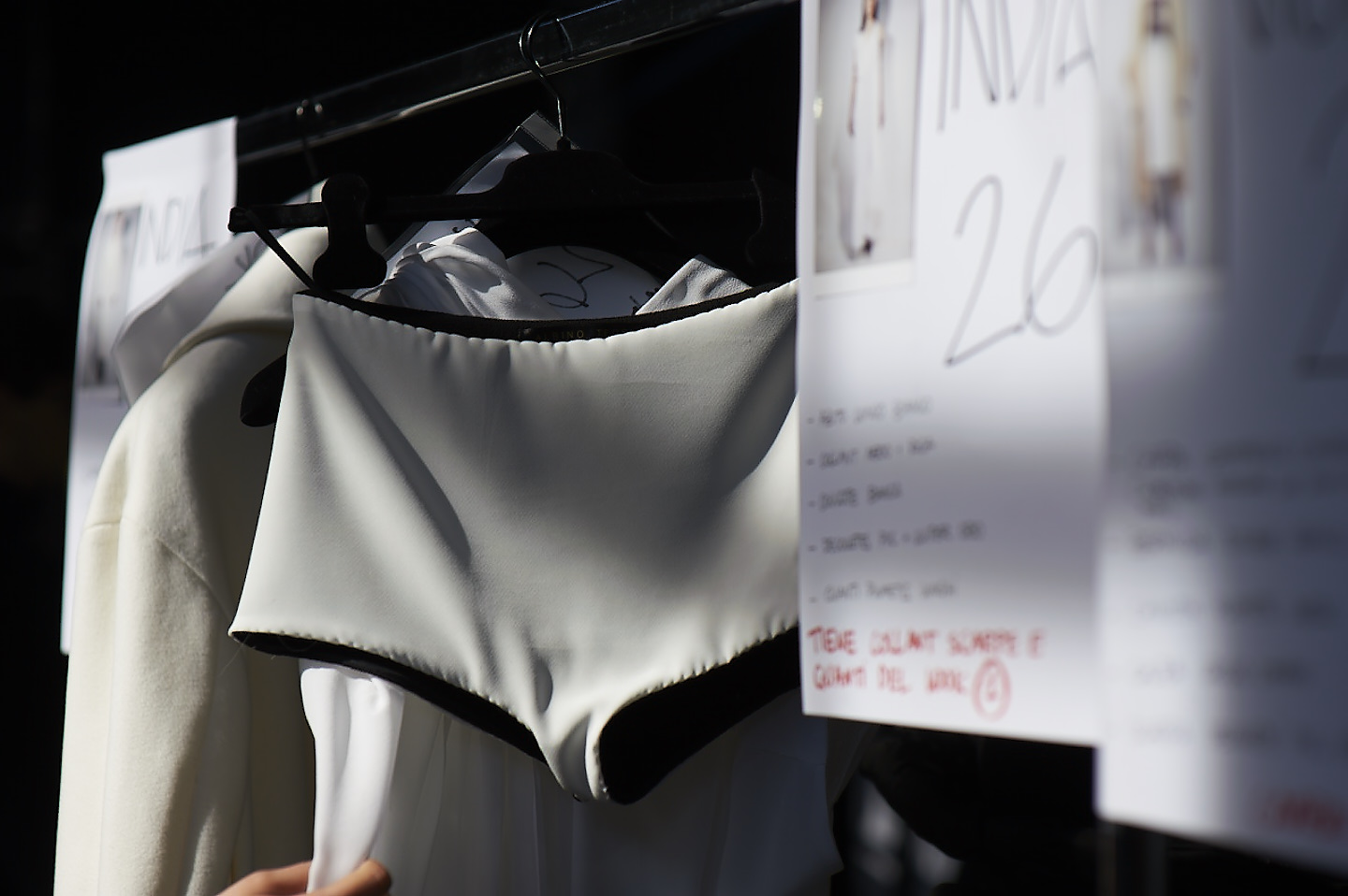 black and white reportage image captured moment backstage narrative fashion tell a story 16