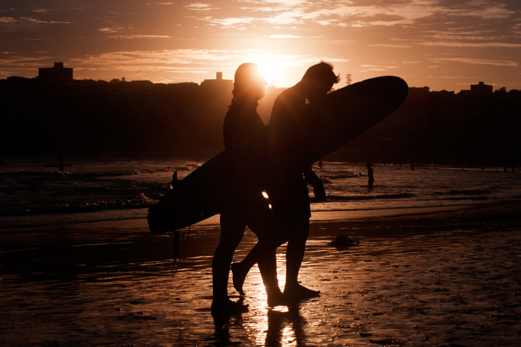 bondi beach sunset two surfers 2