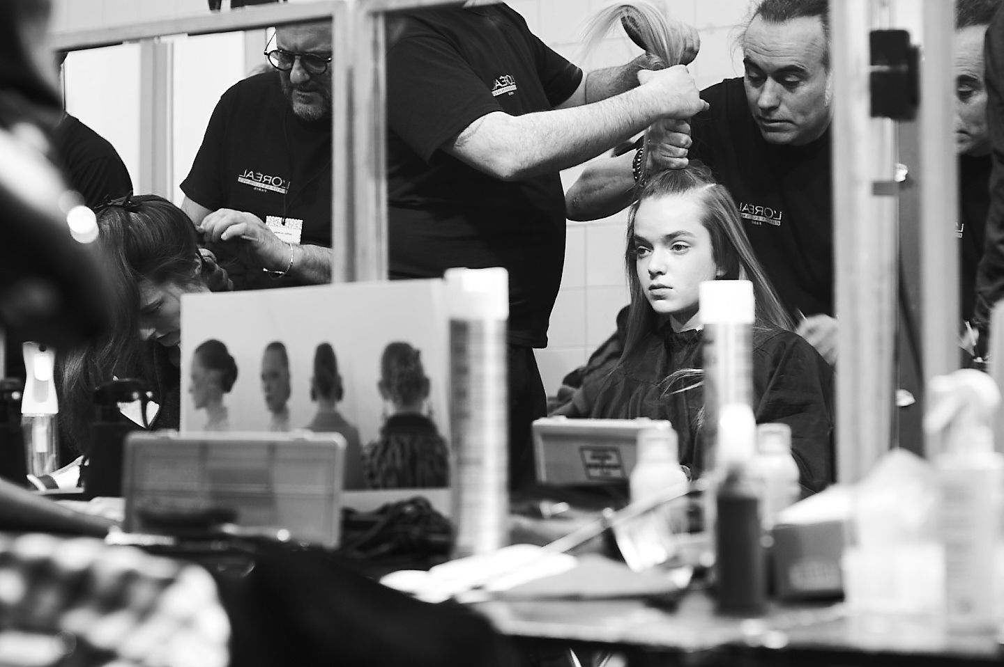 hairdressers working captured moment backstage reportage image narrative fashion tell a story 18