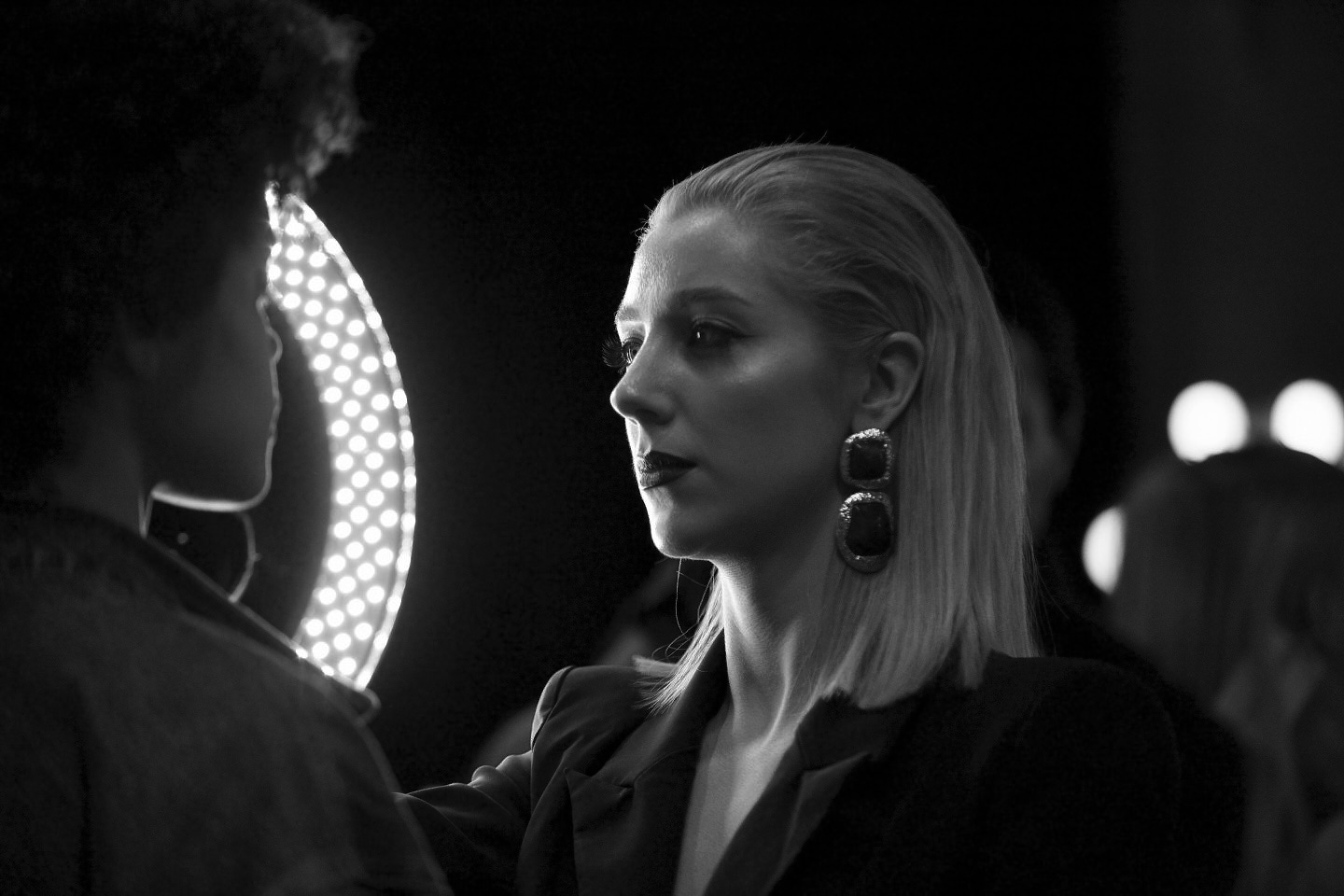 makeup artist prepares model fashion week balck and white tell a story 33