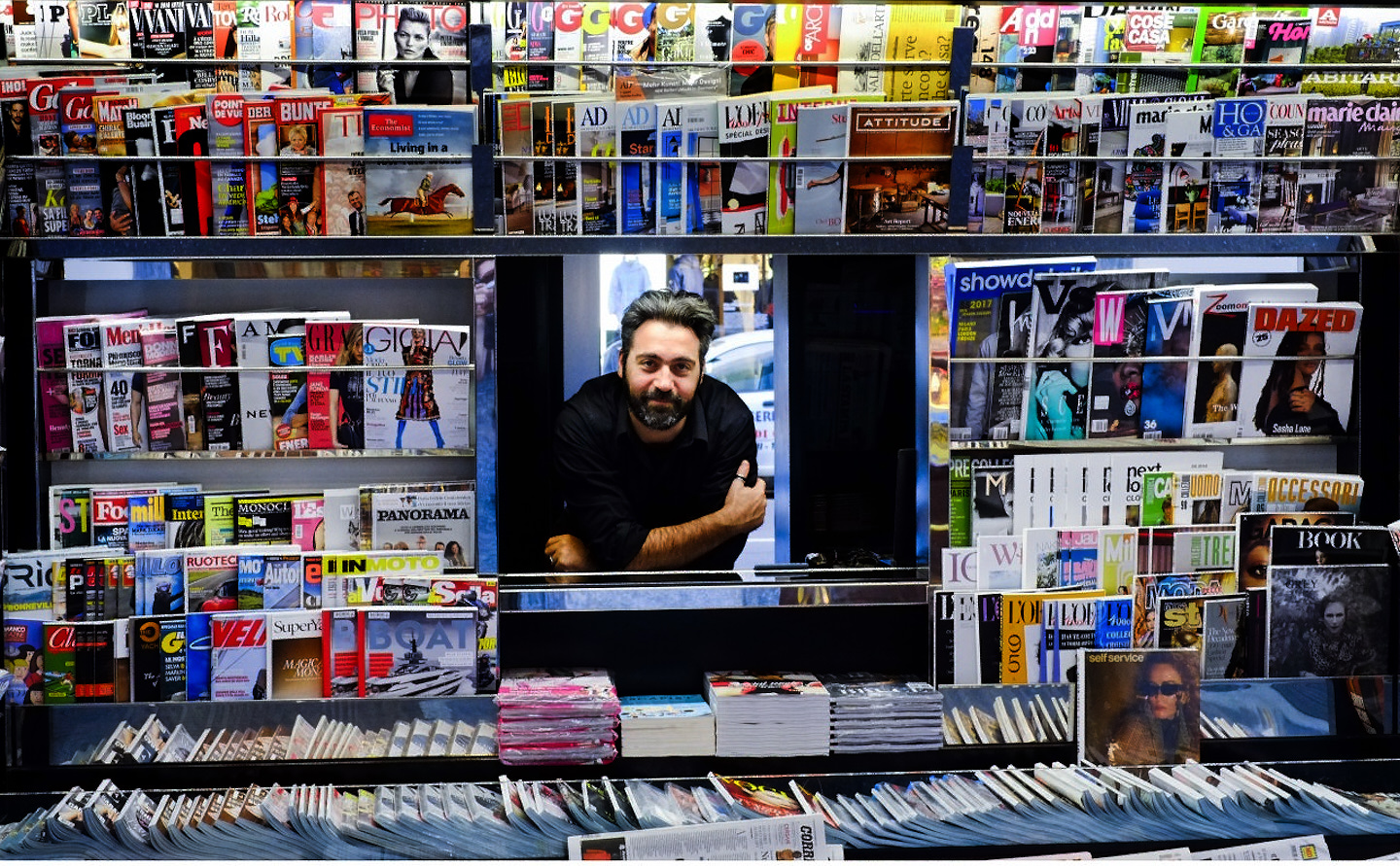 milan newspaper stand magazine man owner print media tell a story 25