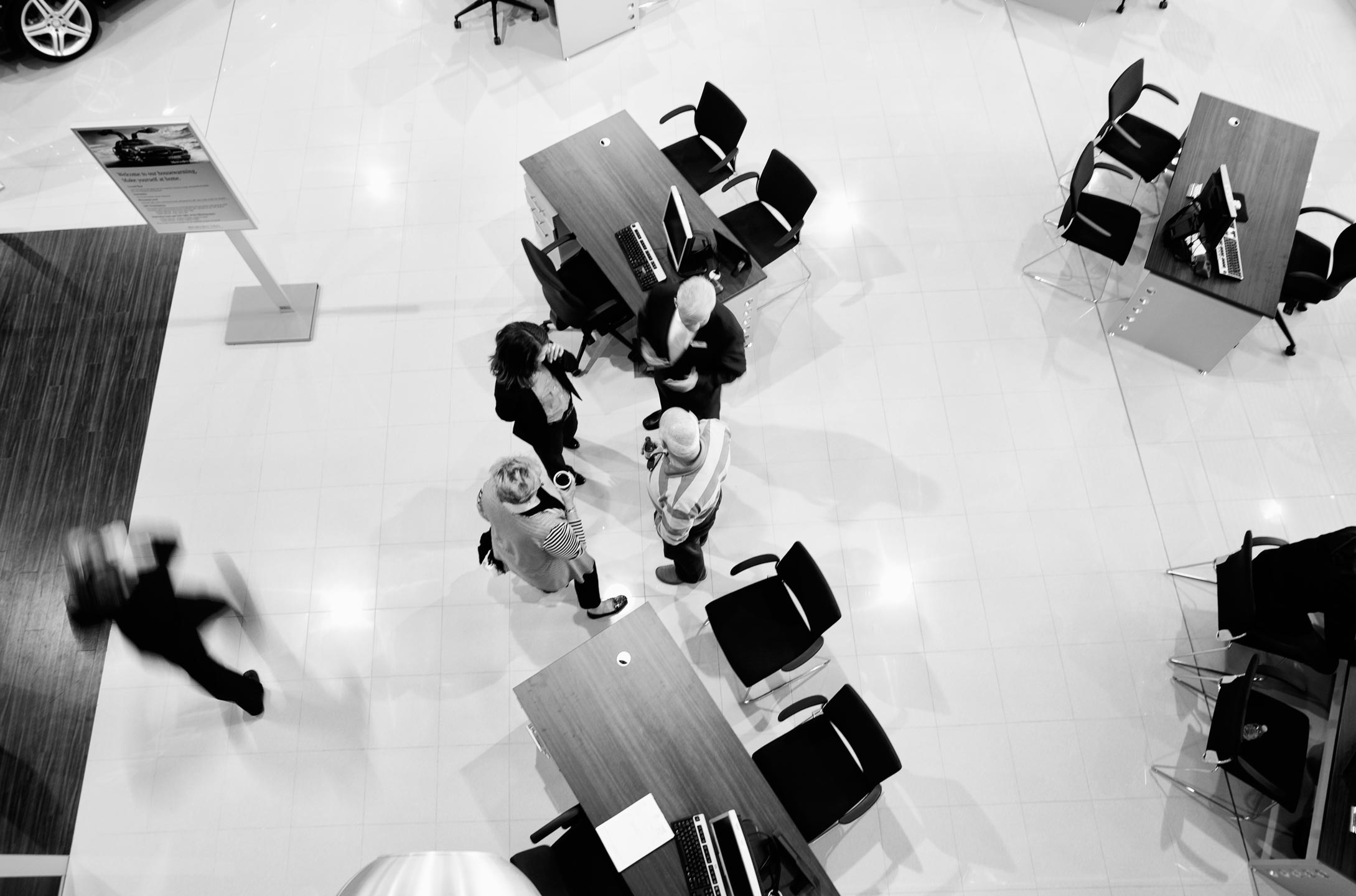 showroom from above mercedes benz black and white tell a story 24