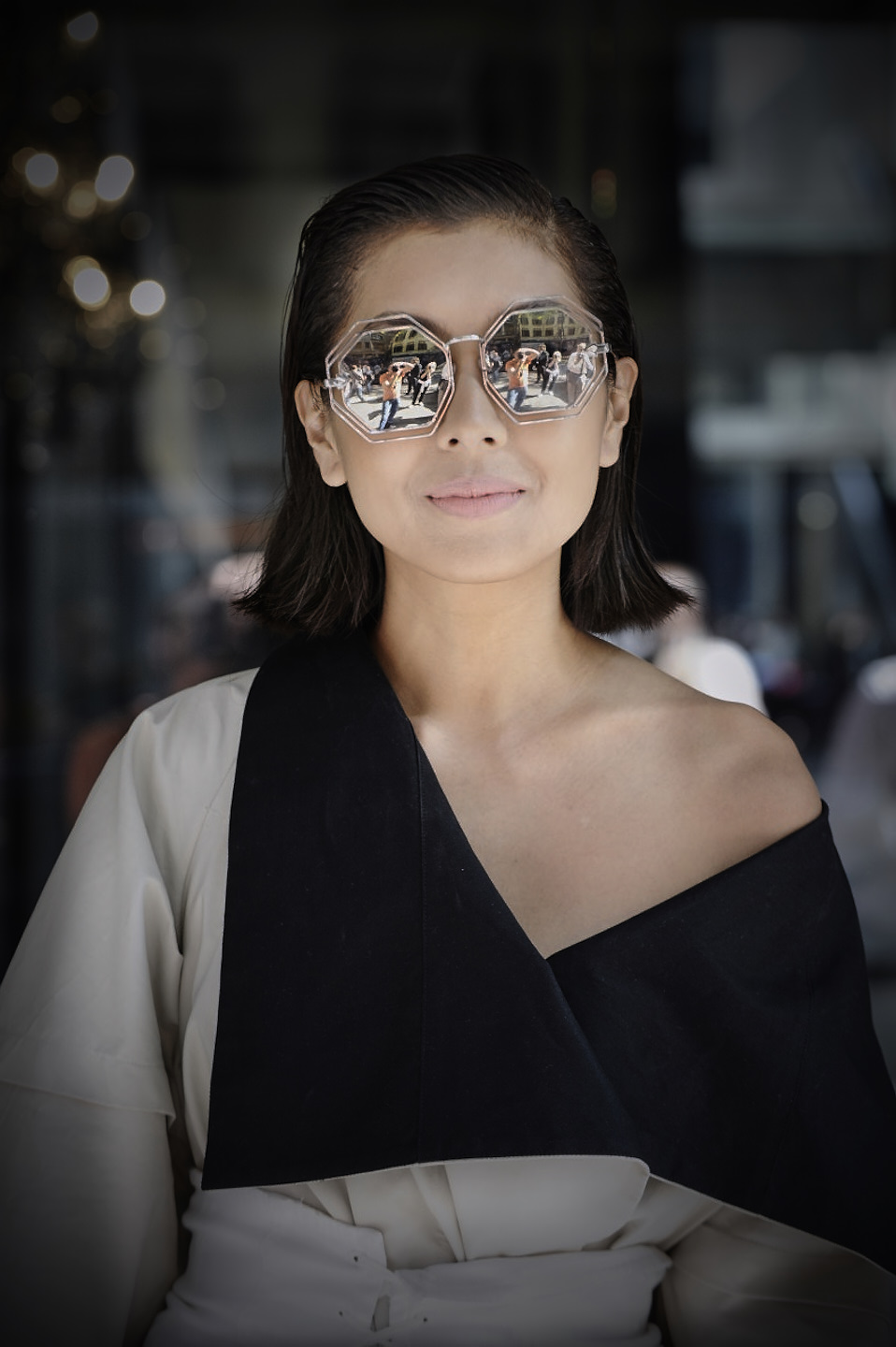 street style milan fashion week outside of dolce gabbana liz uy poses for the cameras sunglasses editorial image 8