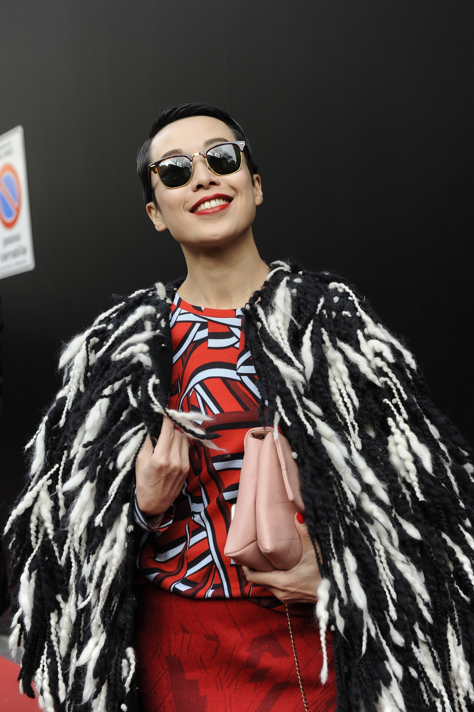 street style milan fashion week outside of dolce gabbana tera feng poses for the cameras sunglasses editorial vogue influencer image 31