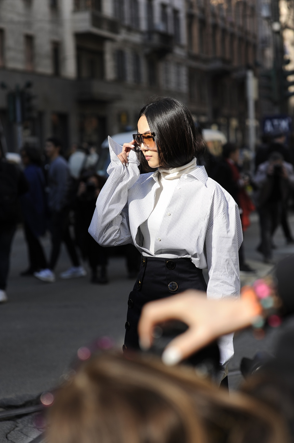 street style milan fashion week outside of dolce gabbana toyo cao poses for the cameras sunglasses editorial vogue influencer image 30