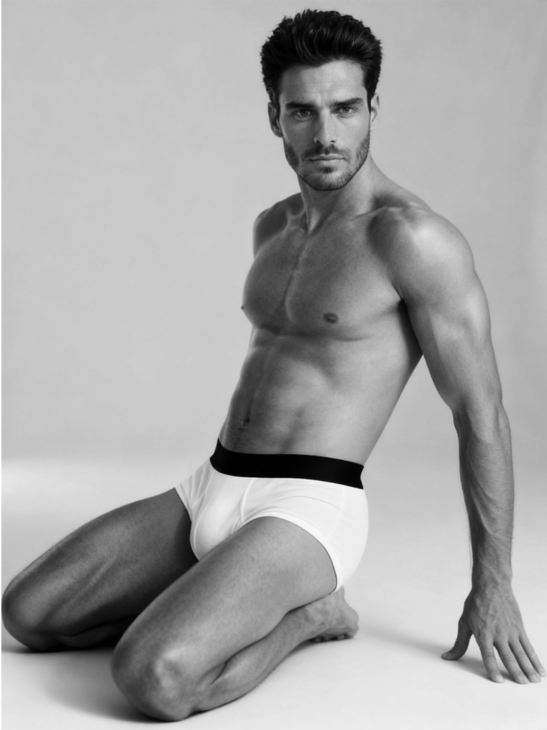 Black and White Portrait of Athletic Man in Minimalist Underwear