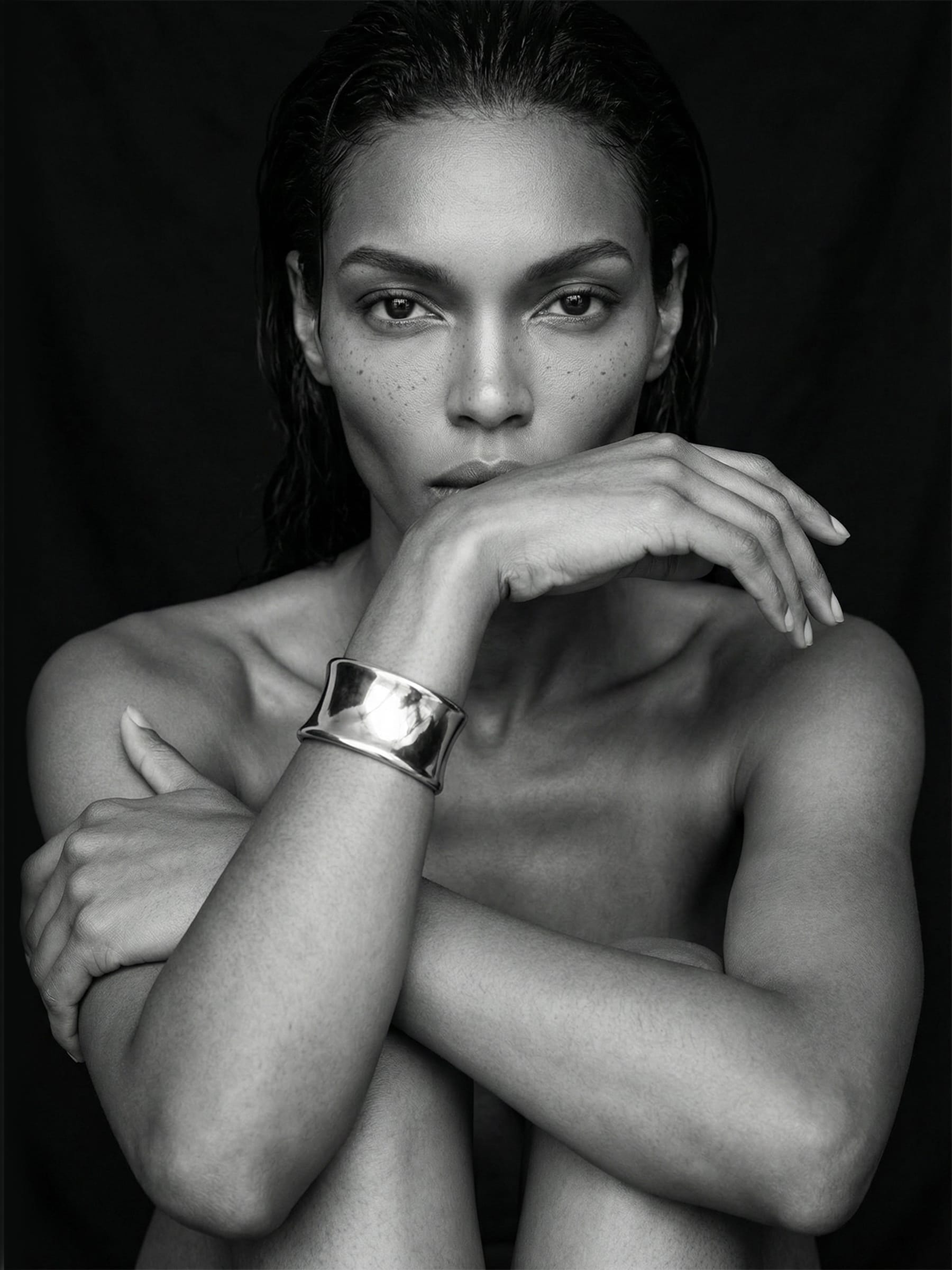 Black and White Portrait of Woman Wearing Silver Cuff Bracelet